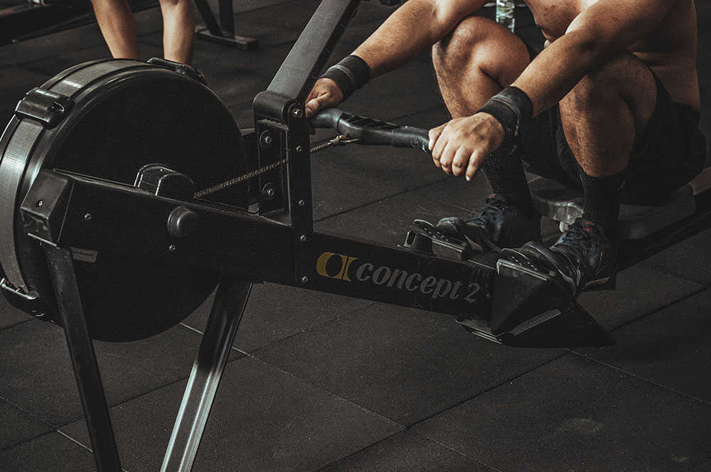 Man athlete doing rowing