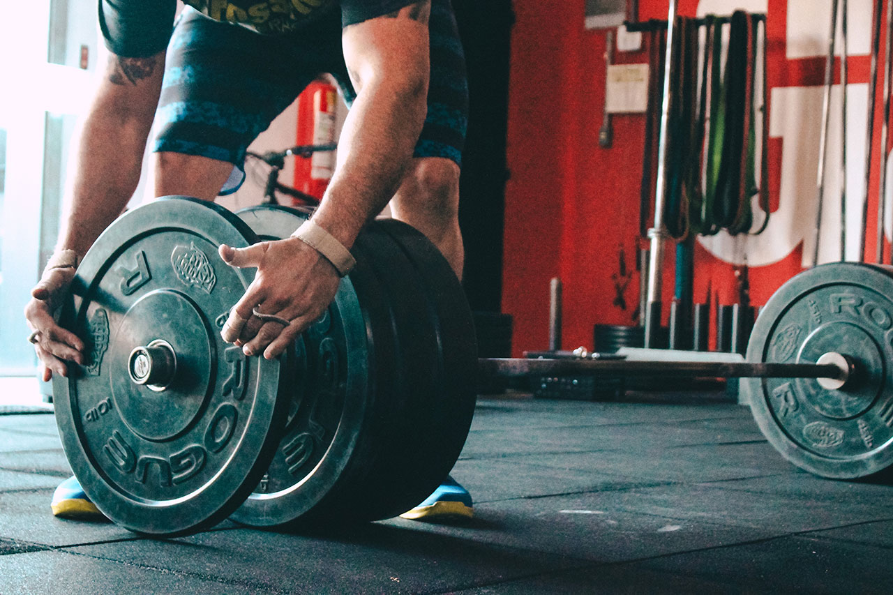 Man lifting a barbell